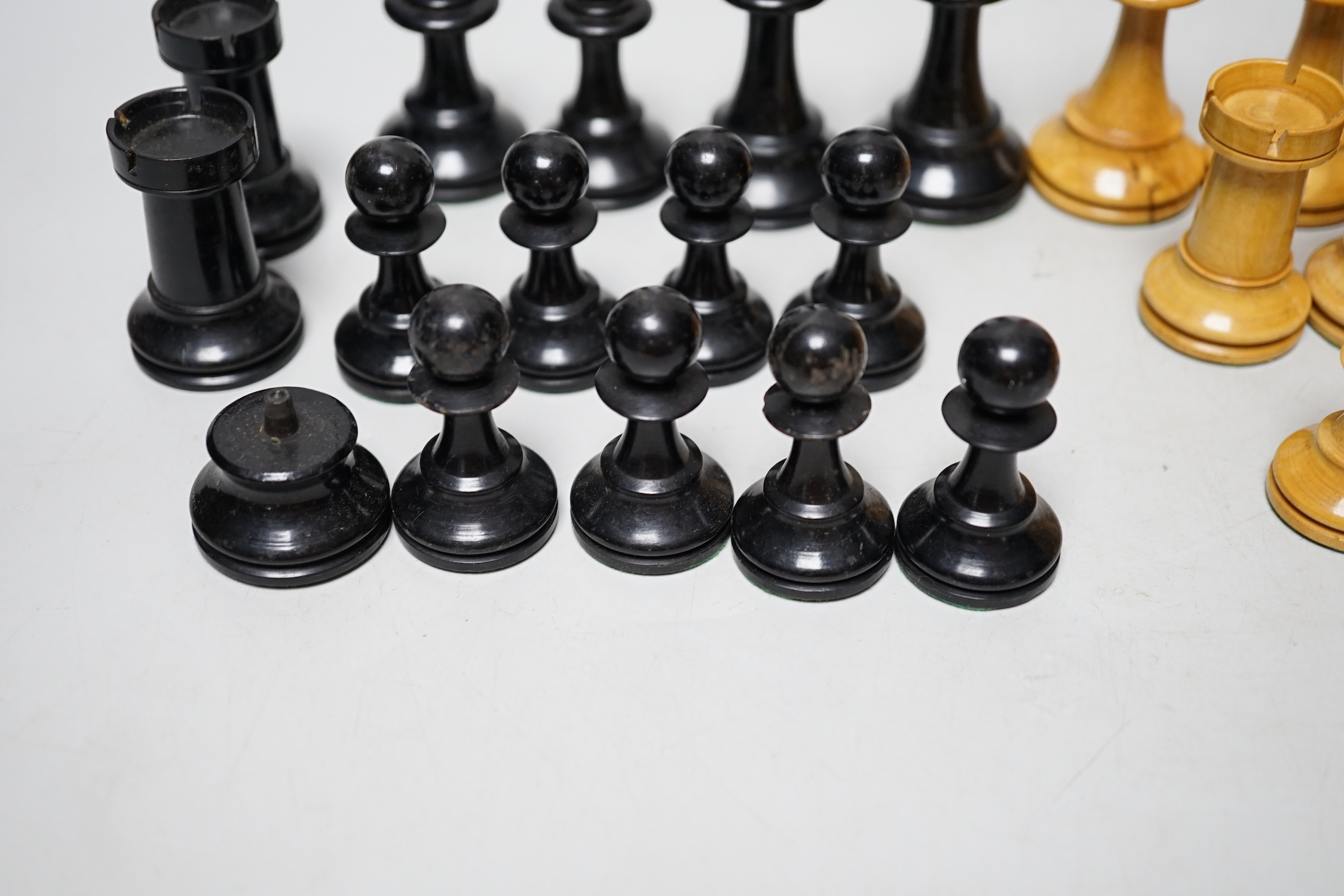 A Staunton pattern lead weighted part boxwood and ebony chess set, kings 8.3cm high (incomplete, lacking both black knights)